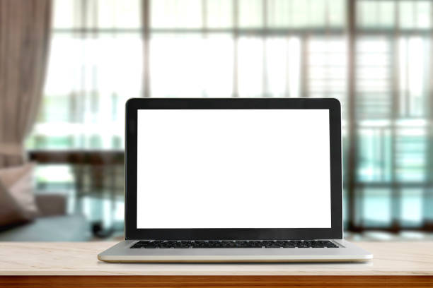 istock Mock up Laptop Blank screen on marble table in living room. 829123998