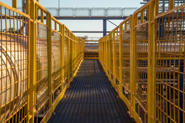 istock handrail industrial yellow fence metallic 829124192