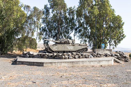 Golan Heights near to Qatsrin city, Israel, July 29, 2017 : Monument to the Israeli tank is after the Doomsday (Yom Kippur War) on the Golan Heights in Israel, near the border with Syria