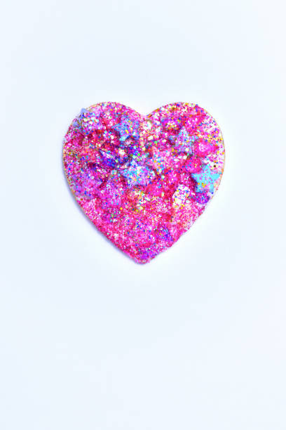 istock Heart glitter and star on white background 829125732