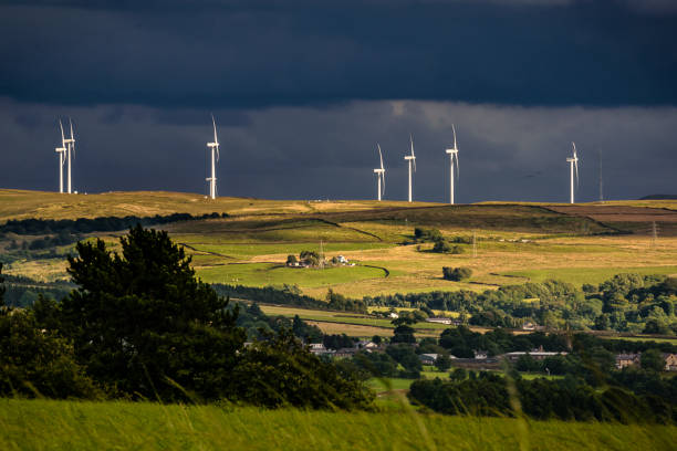 istock Wind turbines and clouds over a farms and hills 829143688