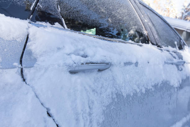 istock Car buried under a snow winter storm 829150146