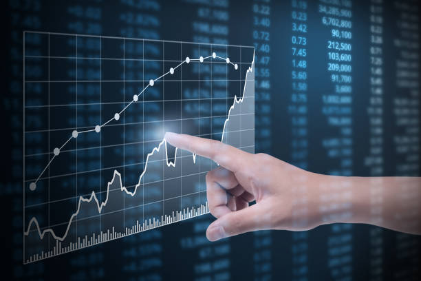 istock hand with financial chart symbols coming from hand 829171340