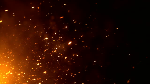 Highly detailed animation of sparks produced by an off-screen fire.