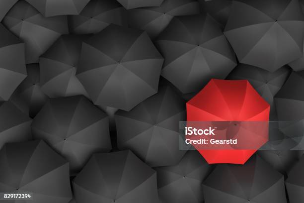 3d Rendering Of Open Bright Red Umbrella Towering Over An Endless Amount Of Similar Black Umbrellas Stock Photo - Download Image Now