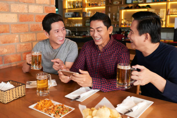 istock Watching funny videos with friends 829184024