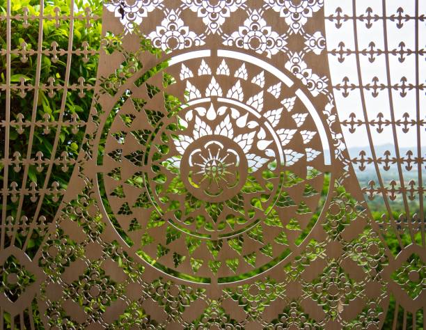 istock Thai Pattern Perforated Metal Sheet On Green Mountain Background 829187098