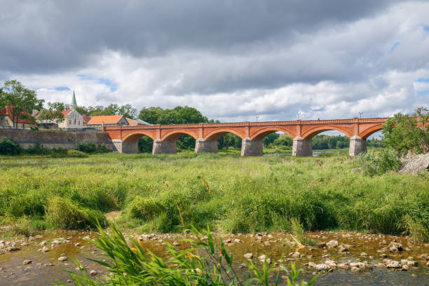 istock Kuldiga bridge and river at Latvia summer. 2017 829218278