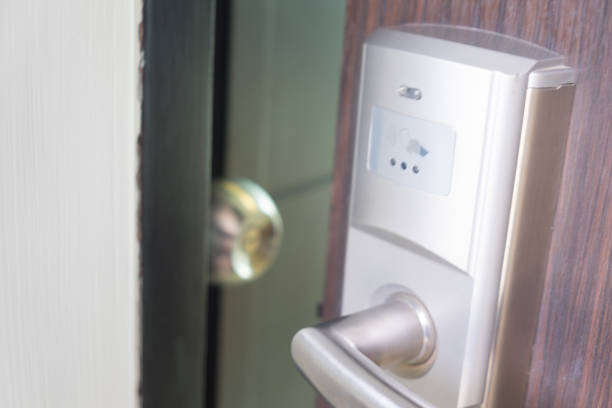 istock Hotel electronic card lock on wooden door 829219340