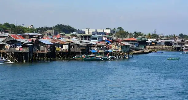 Stilt houses on Davao waterfront at Davao port, Mindanao, Philippines