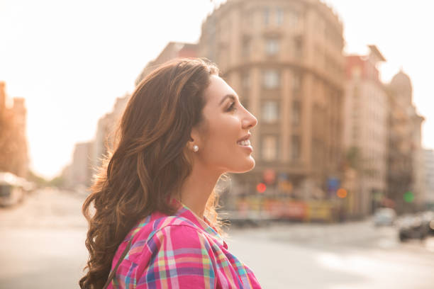 istock Smiling attractive girl looking around 829249584