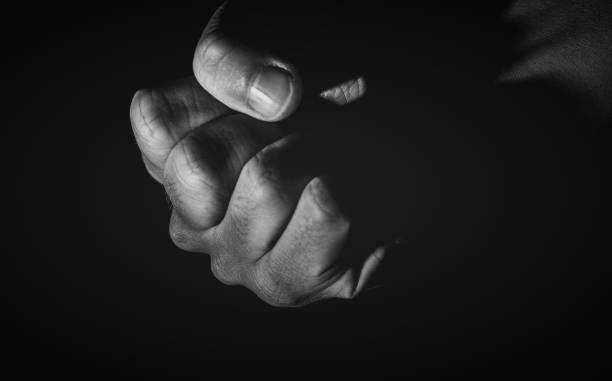istock Human hand from abstract pose in studio tone into black and white 829251742