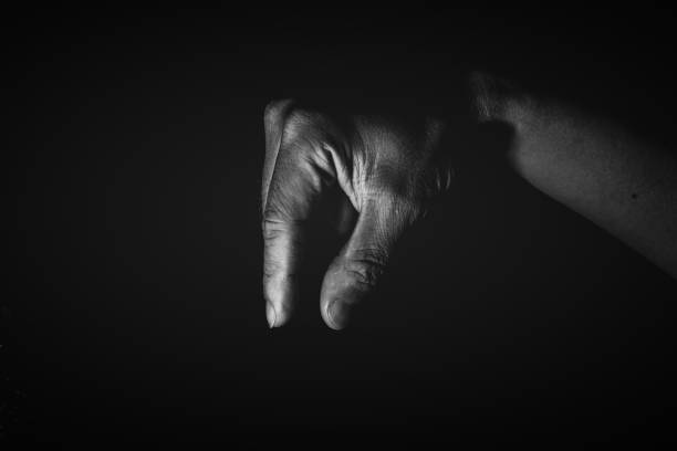istock Human hand from abstract pose in studio tone into black and white 829251800