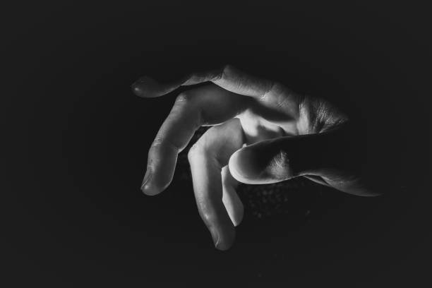 istock Human hand from abstract pose in studio tone into black and white 829251904