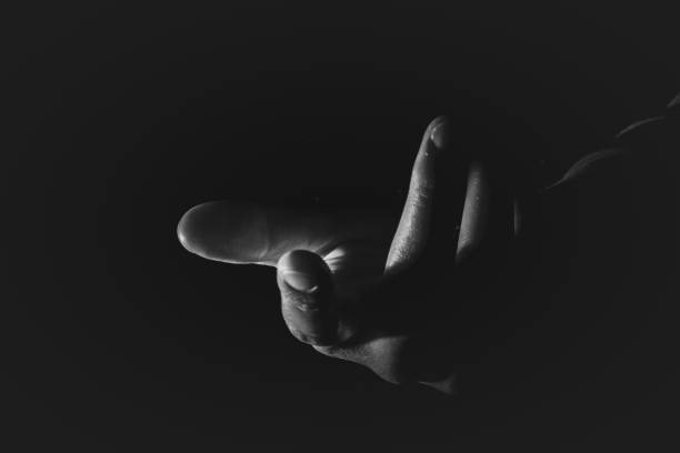 istock Human hand from abstract pose in studio tone into black and white 829251926