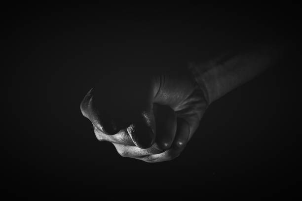 istock Human hand from abstract pose in studio tone into black and white 829251958
