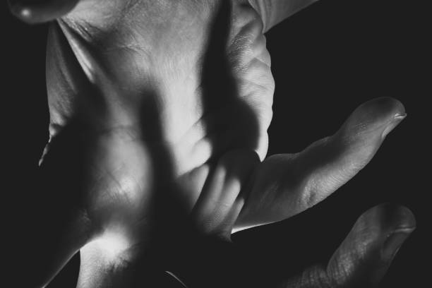 istock Human hand from abstract pose in studio tone into black and white 829251968