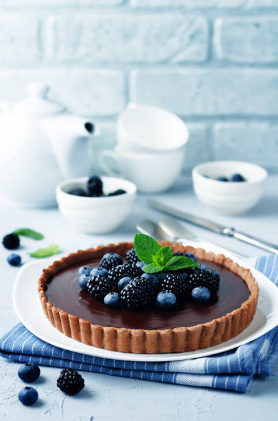 istock Chocolate tart with blackberries and blueberries 829251996