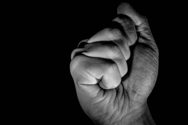 istock Human hand from abstract pose in studio tone into black and white 829252264