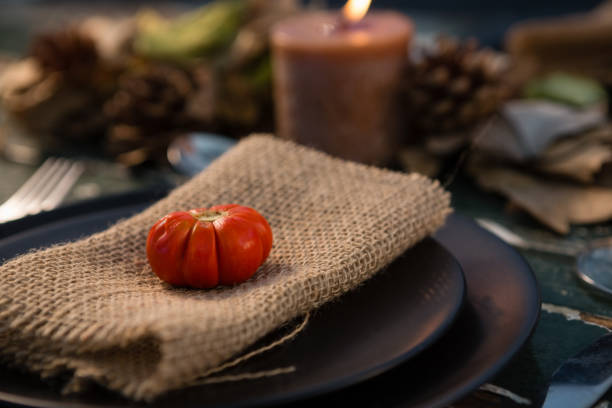 istock Close up of tomato on burlap in plate 829258318