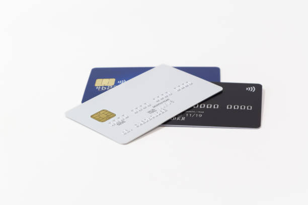 istock White, black and blue credit cards on white background 829260234