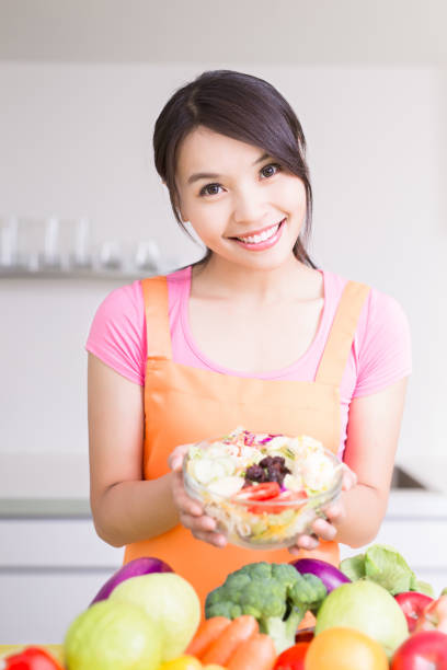 istock beauty housewife in kitchen 829295072