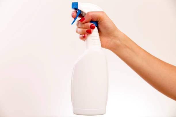 istock Studio shot of a hand holding a cleaning spray bottle on white background 829303366