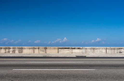Malecon by the sea with no car driving through. Havana, Cuba