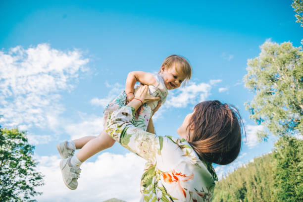 istock The mother hold on hands her daughter 829358960