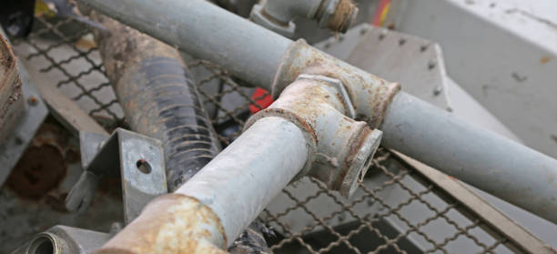 istock rusty iron pipe and other ferrous material ready for recycling 829359690