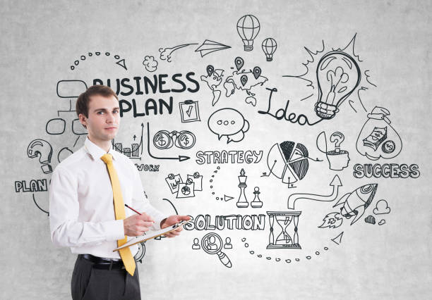 istock Businessman with a clipboard, business plan 829359796