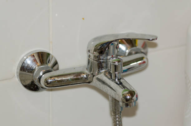 istock Used silver bath mixer in the bathroom 829360650