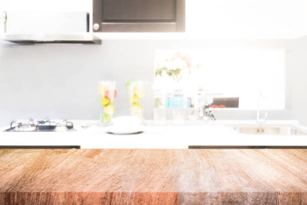 istock Empty wooden table and blurred kitchen background for display or montage your products 829364096