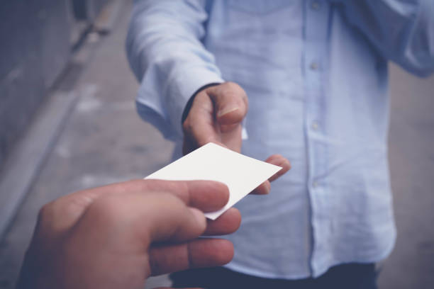 istock Hand hold blank white card mockup 829373114