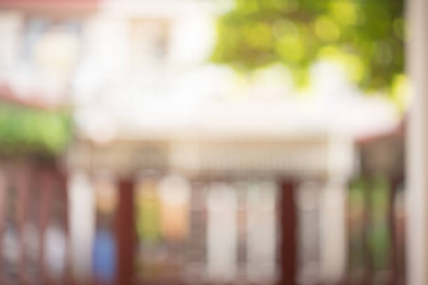 istock Bokeh natural landscape townhome blurred background. 829374392