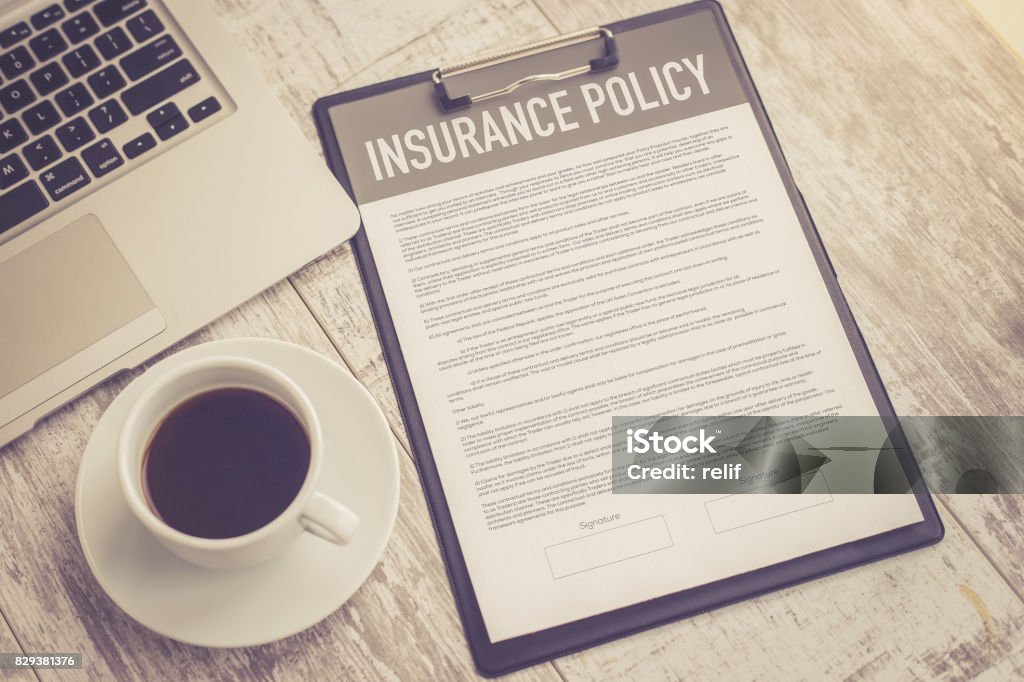 INSURANCE POLICY CONCEPT Insurance Stock Photo