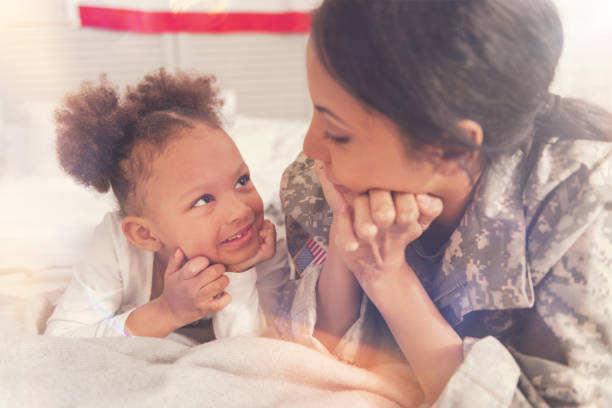 istock Loving mother and her daughter looking at each other 829382282