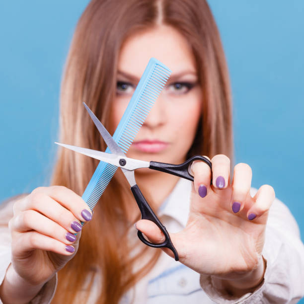 istock Female hairdresser presenting tools. 829388658