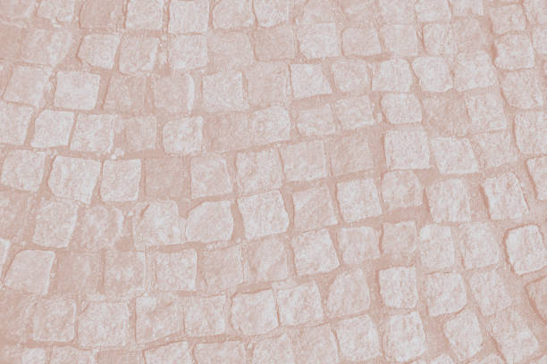 Stone pavement texture. Granite cobblestoned pavement background