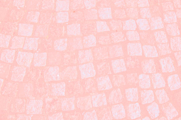 istock Abstract background of old cobblestone pavement close-up. Seamless texture. 829406940