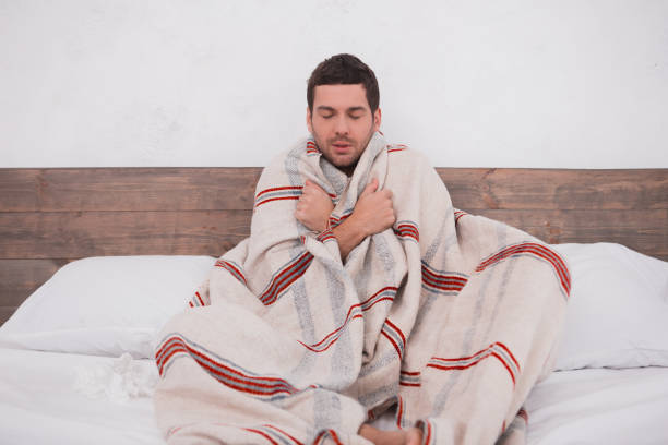 istock Sick young man fever concept 829407058