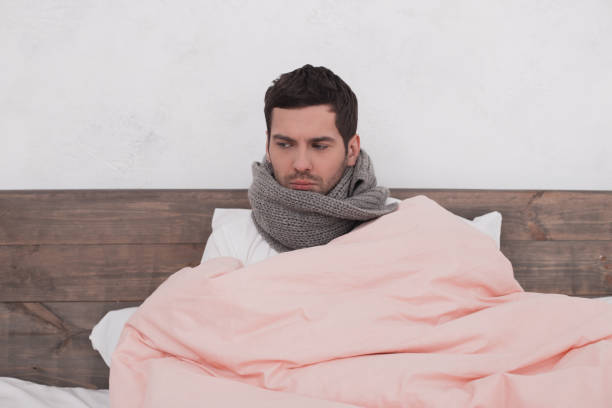 istock Sick young man fever concept 829408056