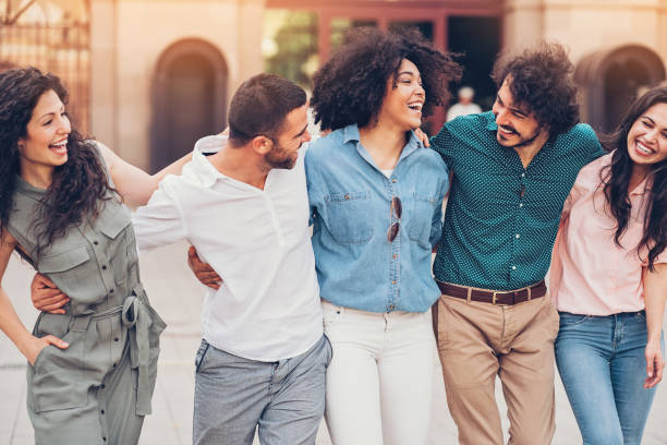 istock Happy friends walking together 829413980