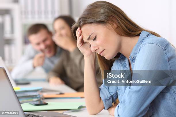 Bullying Victim Being Criticized At Office Stock Photo - Download Image Now - Bullying, Place of Work, Office