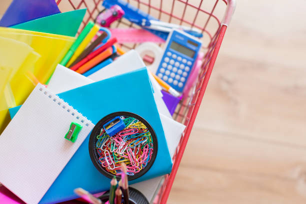 School supplies in shopping cart.