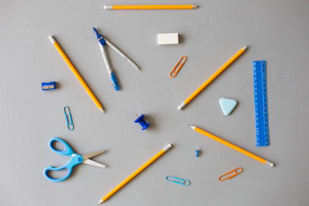 istock School supplies on grey background 829436852