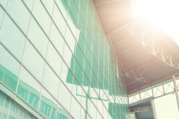 istock industrial glass building with sunlight 829445482