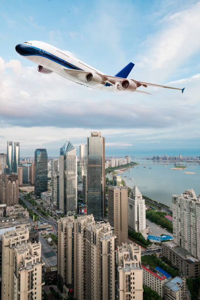 istock Low angle view of jet airliner taking off 829451536
