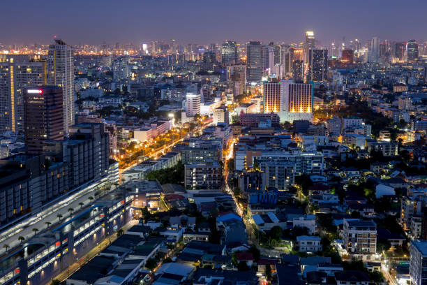istock Bangkok city scrapers with high building at night time 829453432