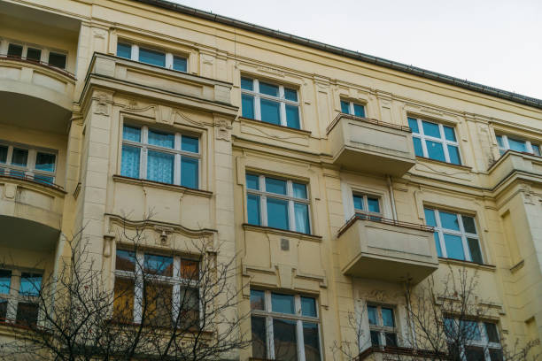 istock real estate building with yellow facade and blue windows 829467574